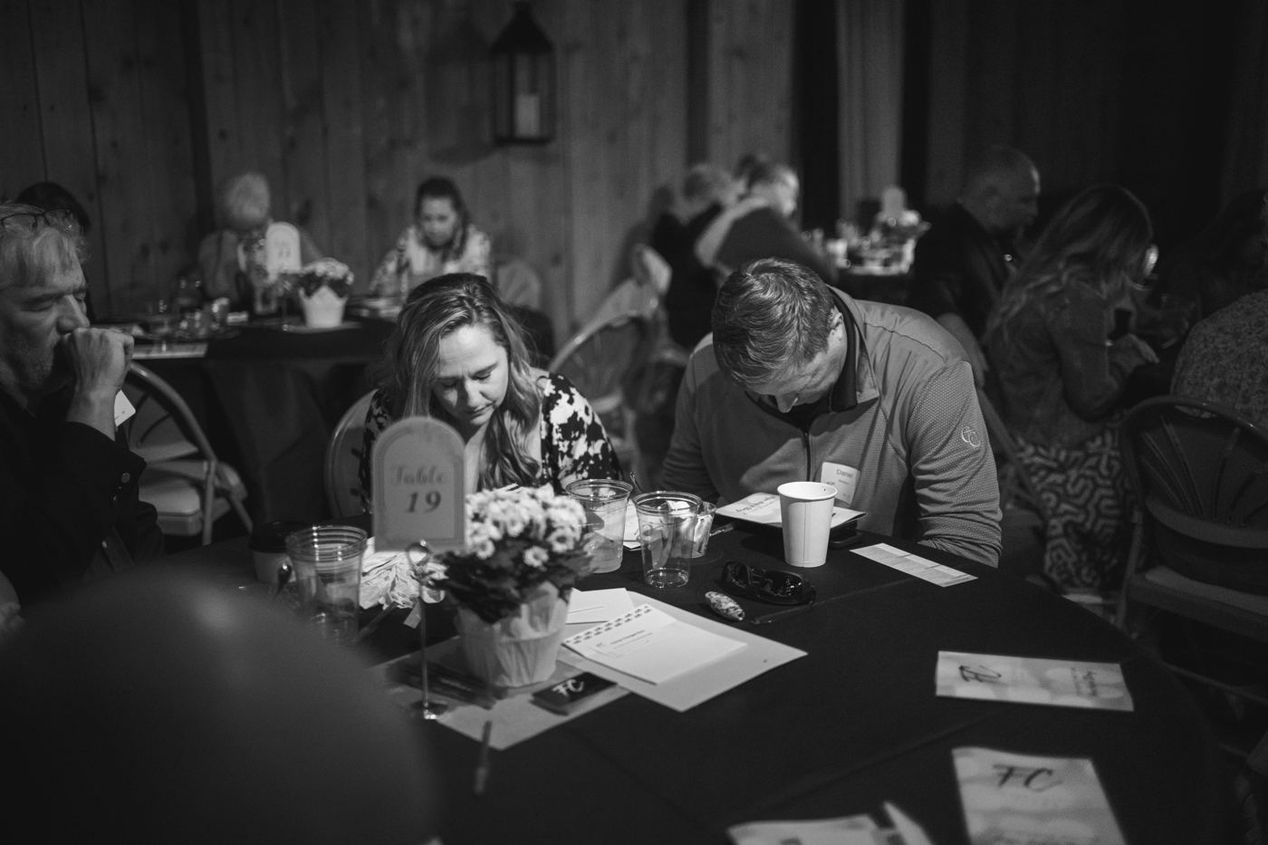 Guests filling out their giving cards
